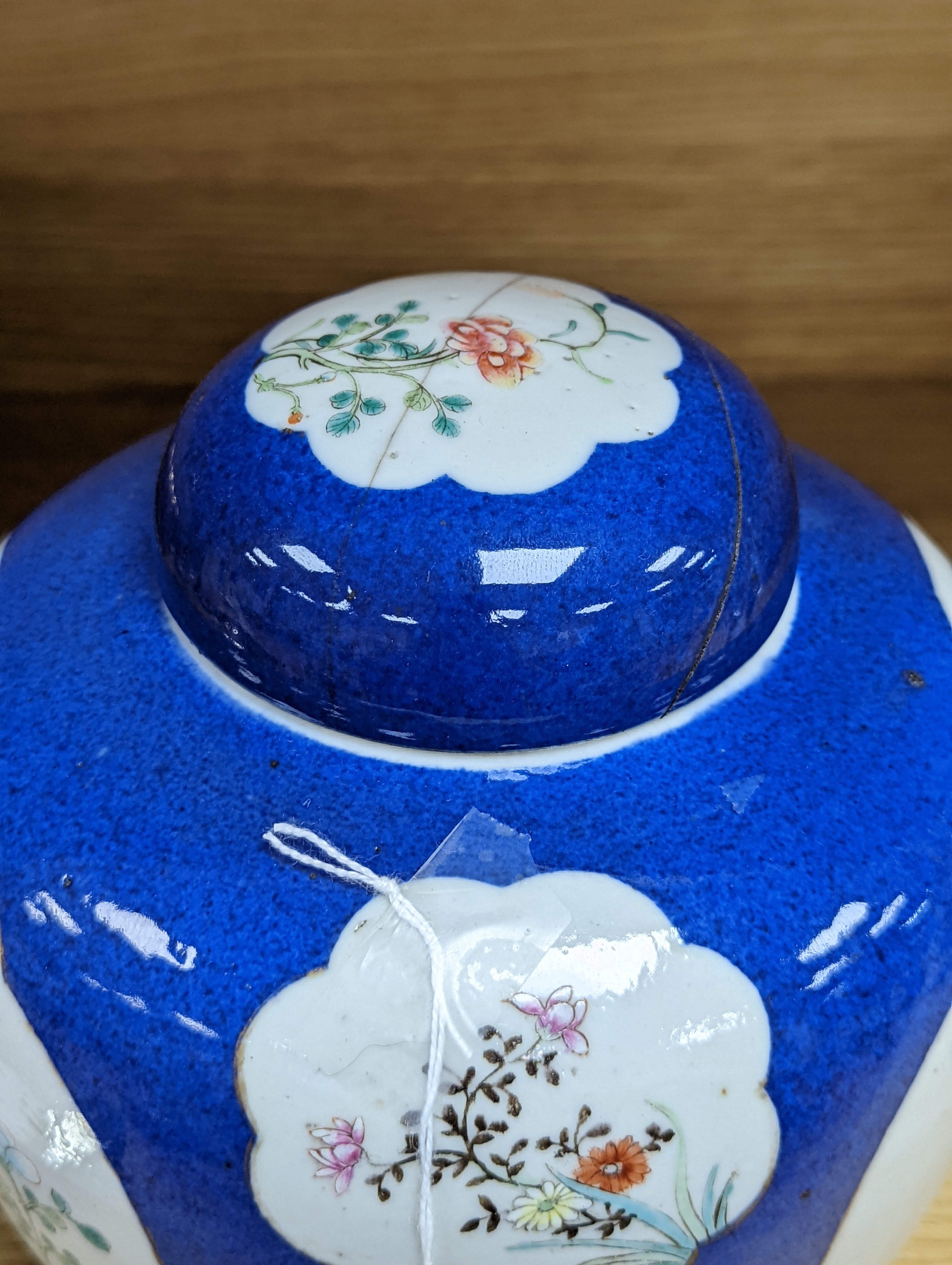 A Chinese blue ground jar and cover, 19th century, Qianlong mark to base, 20cm high